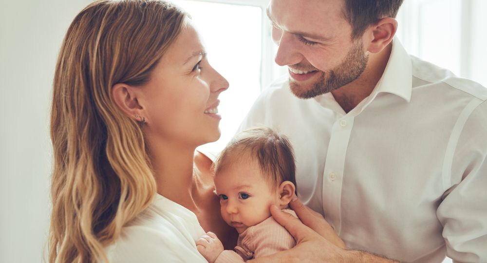 loving couple with a baby