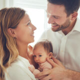 loving couple with a baby