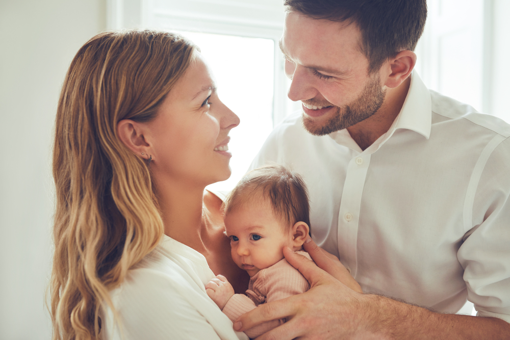 loving couple with a baby