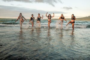 Photoshoot of pregnant women's playing in Beach